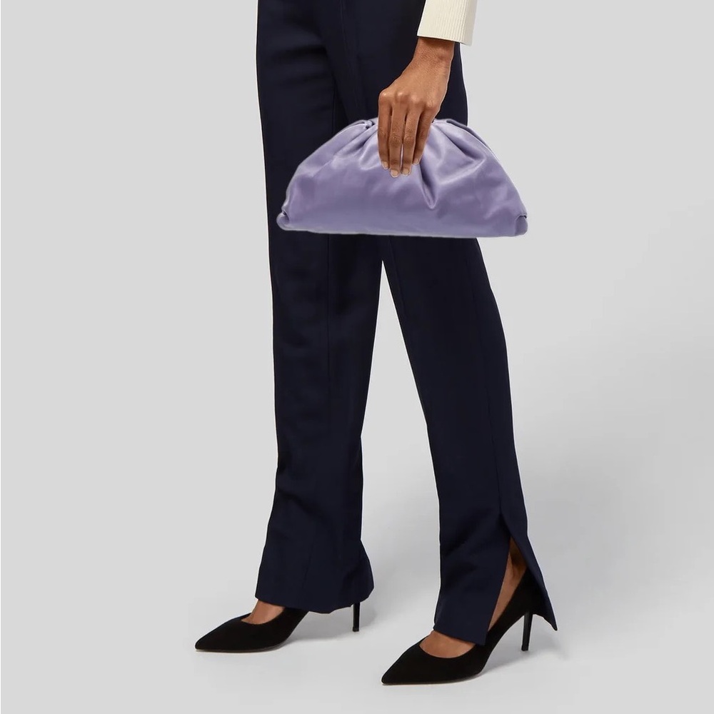 The pouch dumpling clutch bag purple calfskin
